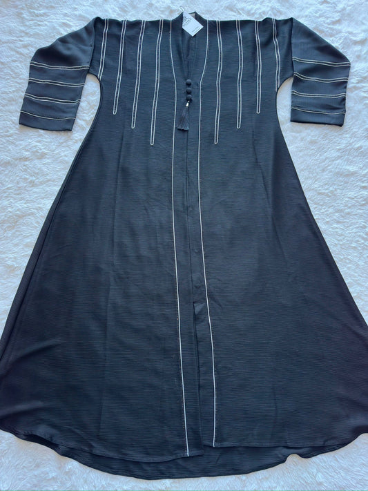 Designer black crêpe silk abaya featuring flared silhouette with handcrafted dori and stone detailing