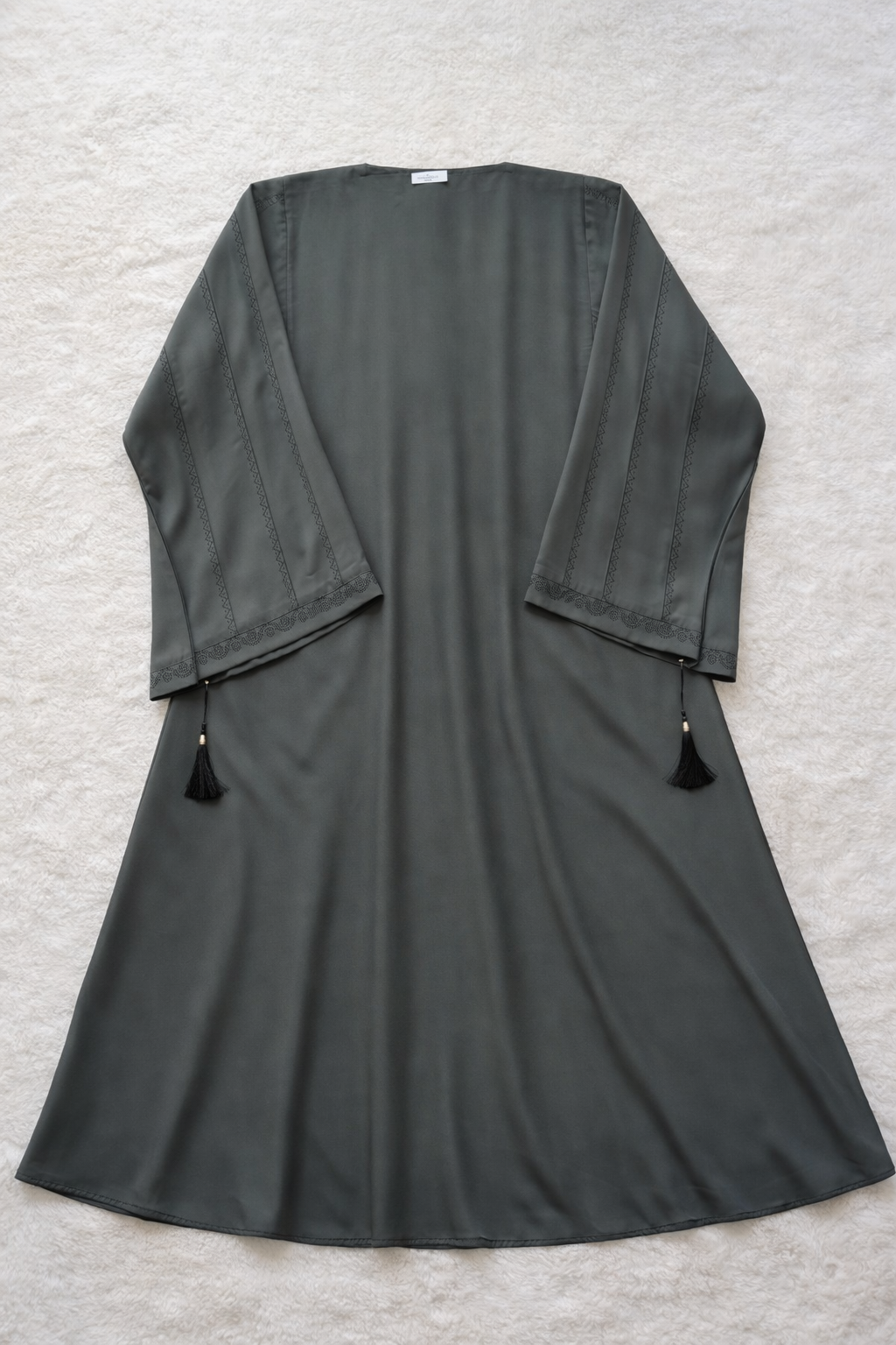 Back view Smooth nida fabric texture of RUHKÉ luxury olive grey abaya