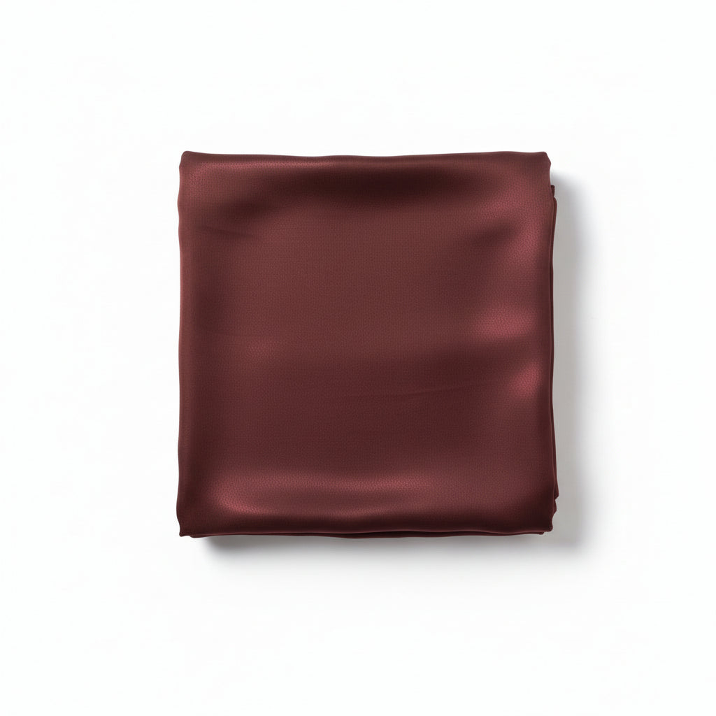 Brown satin crêpe Korean silk hijab folded neatly, showcasing premium fabric texture by RUHKÉ™