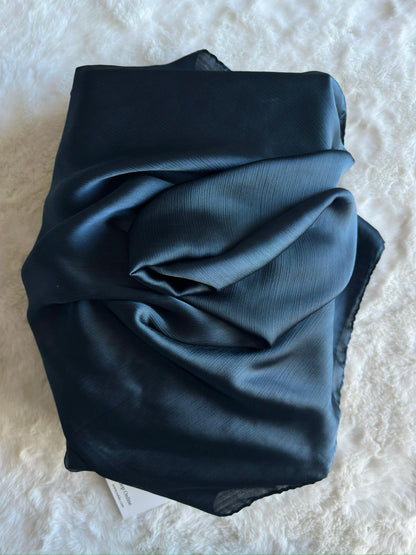 Close-up of steel blue Korean silk satin crêpe hijab fold drape, highlighting smooth luxury finish by RUHKÉ™