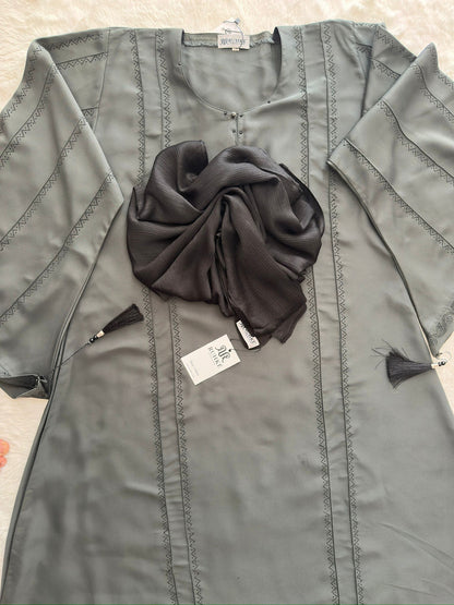 Close-up of stone embellishment on RUHKÉ olive grey luxury abaya