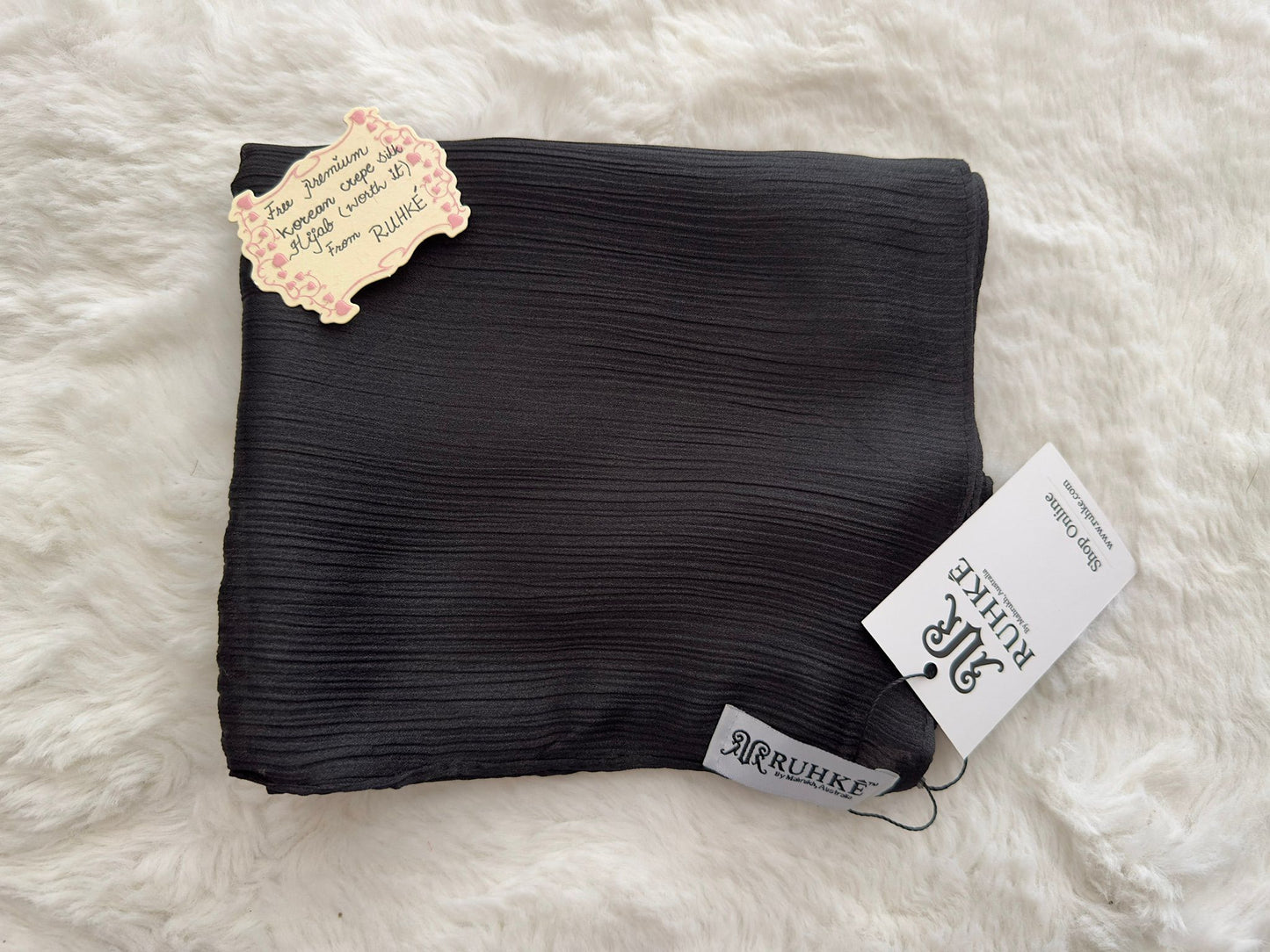 Korean crêpe silk black hijab with soft drape and lightweight luxury finish