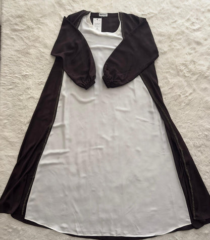 Flat lay of luxury brown textured open abaya crafted in crinkle crepe silk blend
