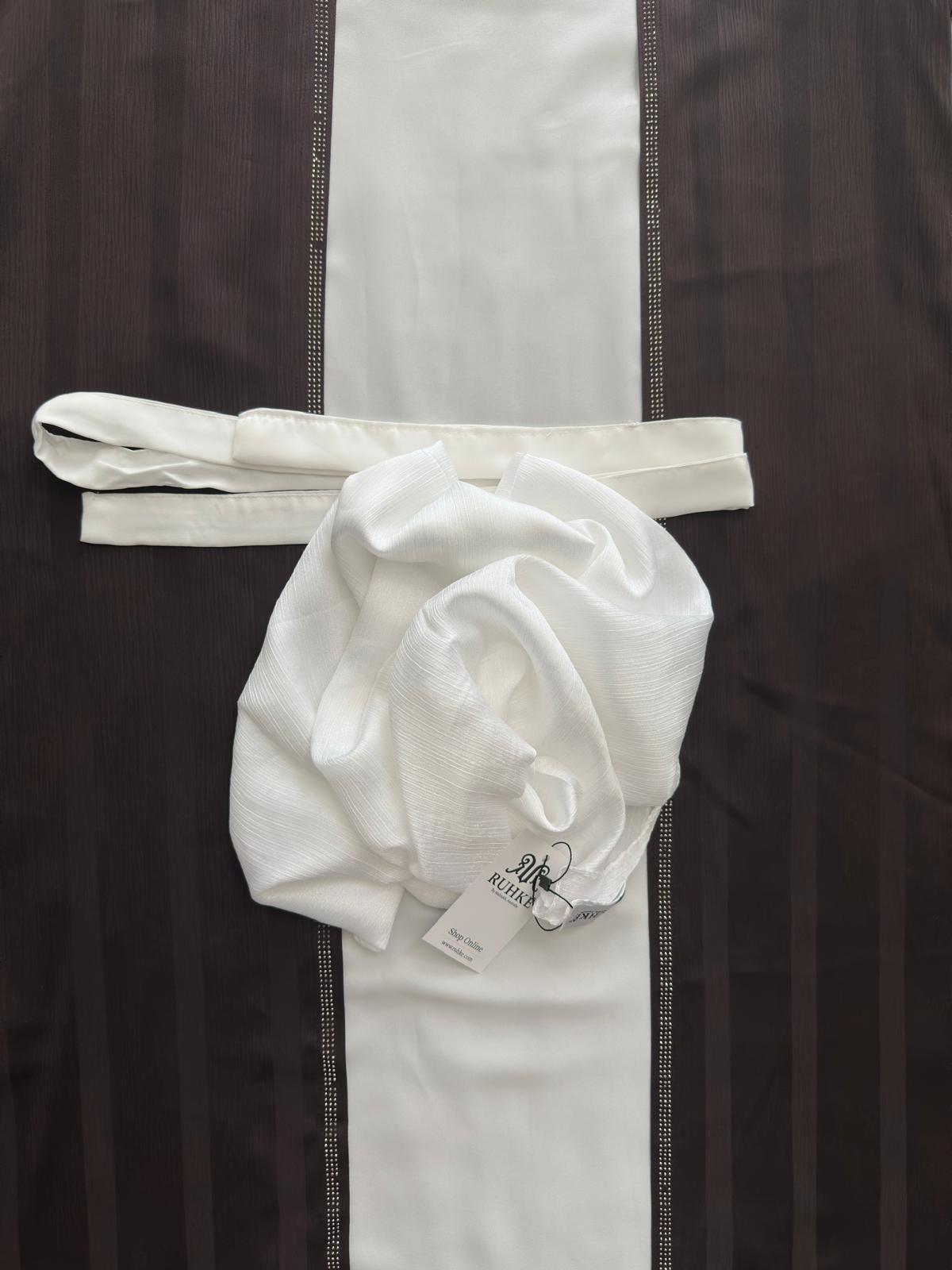 Flat lay of white Korean silk crêpe hijab with soft textured finish