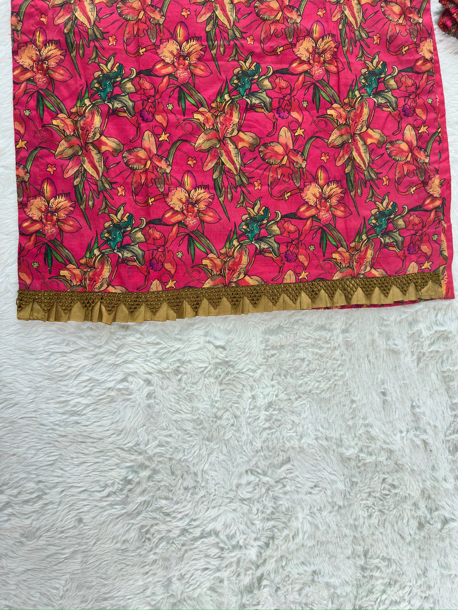 Contrast lace patch detailing on daman of printed lawn dress