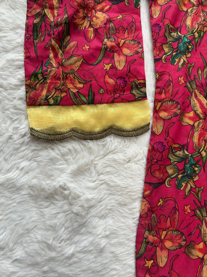 Close-up of organza lace patch detailing on printed lawn dress sleeve