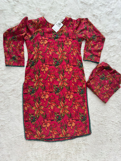 Flat lay of luxury printed lawn 2 piece suit including shirt and trouser