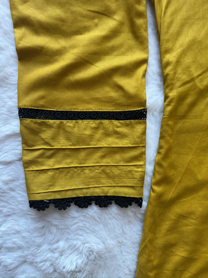 Black lace detailing on sleeve of mustard lawn long dress