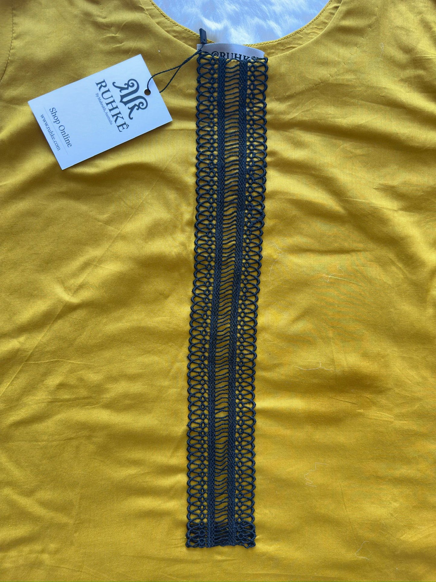 Black fringe front neck detailing on mustard yellow lawn dress