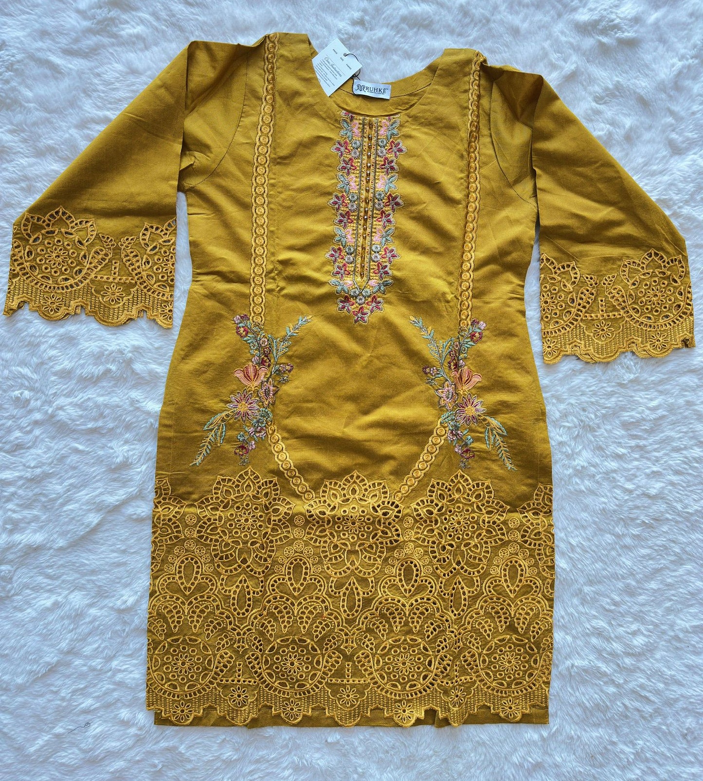 Embroidered front neck detailing on mustard viscose khadi shirt