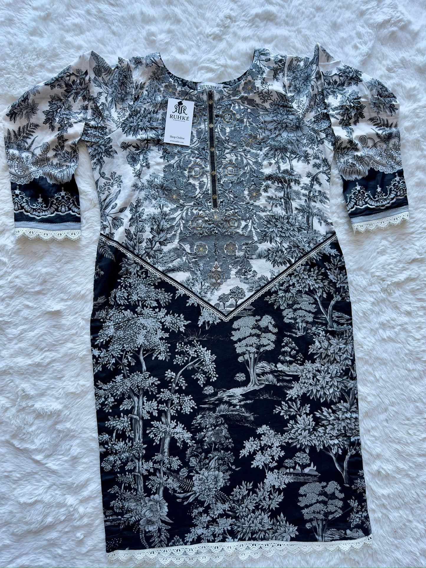 Front embroidery detail on printed lawn shirt with lace trim shirt