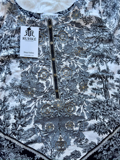 Lace detailing on lawn shirt front close-up