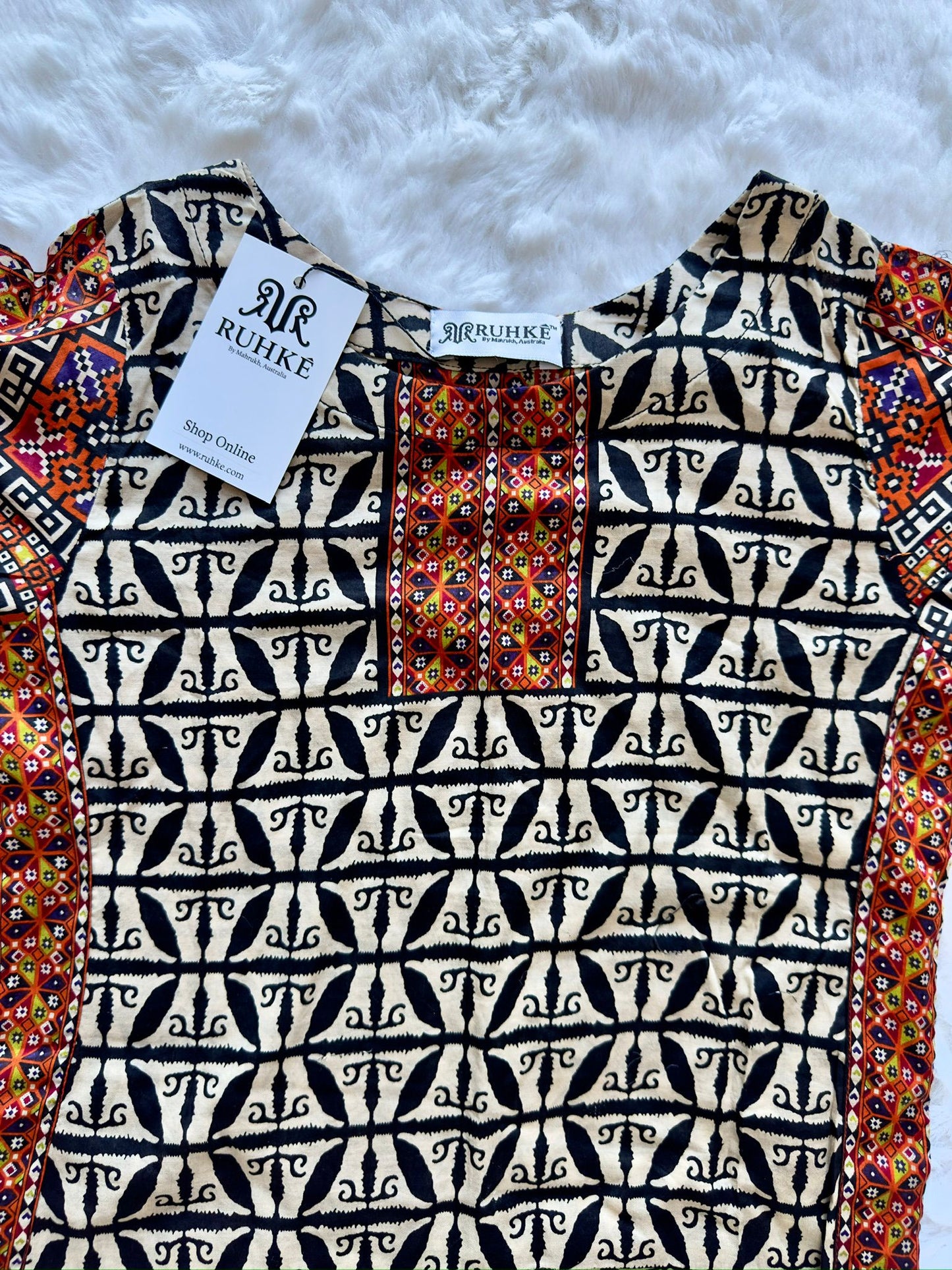 Contrast printed border on girls lawn shirt front