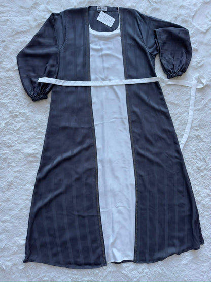 Charcoal grey textured silk flared abaya for women, designer modest fashion with fluid drape flat lay