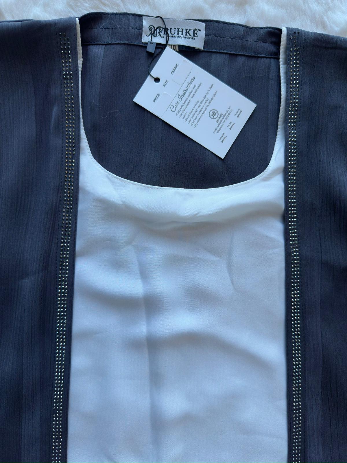 Premium charcoal grey silk abaya featuring textured fabric and graceful flare, by RUHKÉ Australia zoomed neck