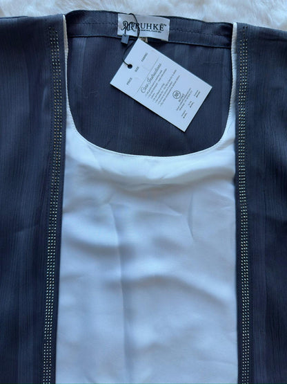 Premium charcoal grey silk abaya featuring textured fabric and graceful flare, by RUHKÉ Australia zoomed neck