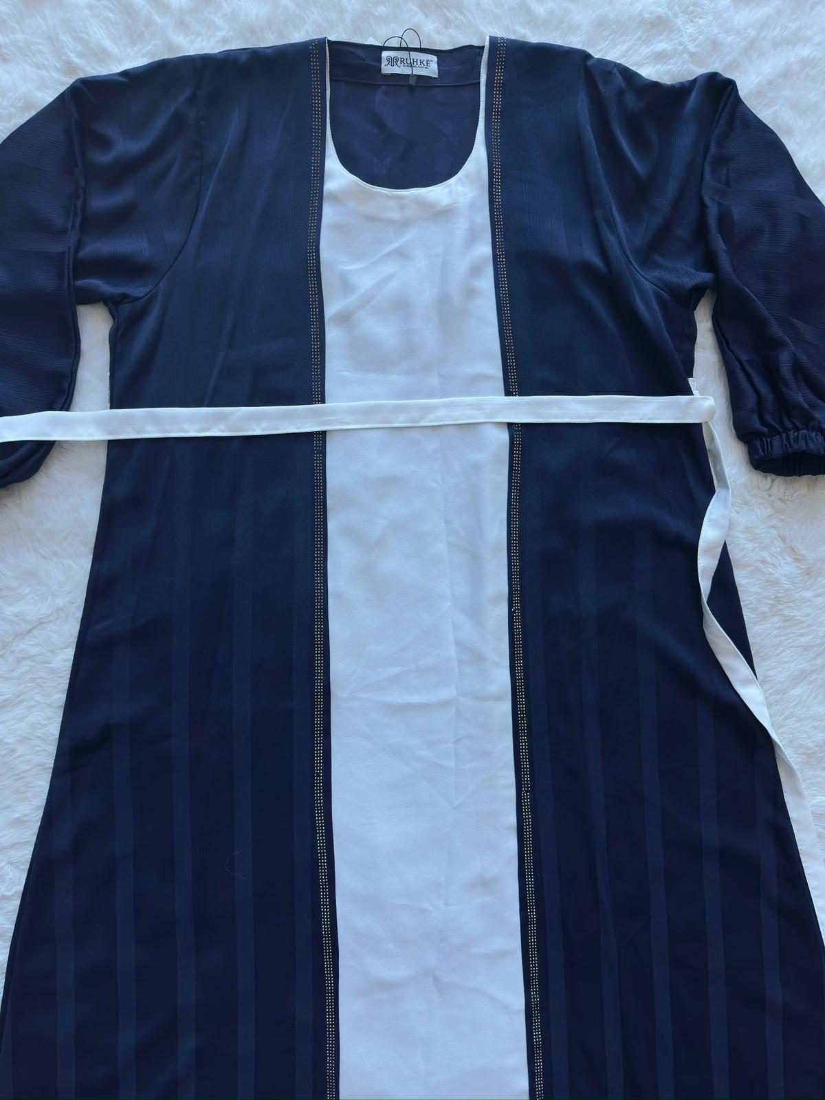 Designer royal navy silk abaya with textured fabric, premium modest fashion for formal and evening wear