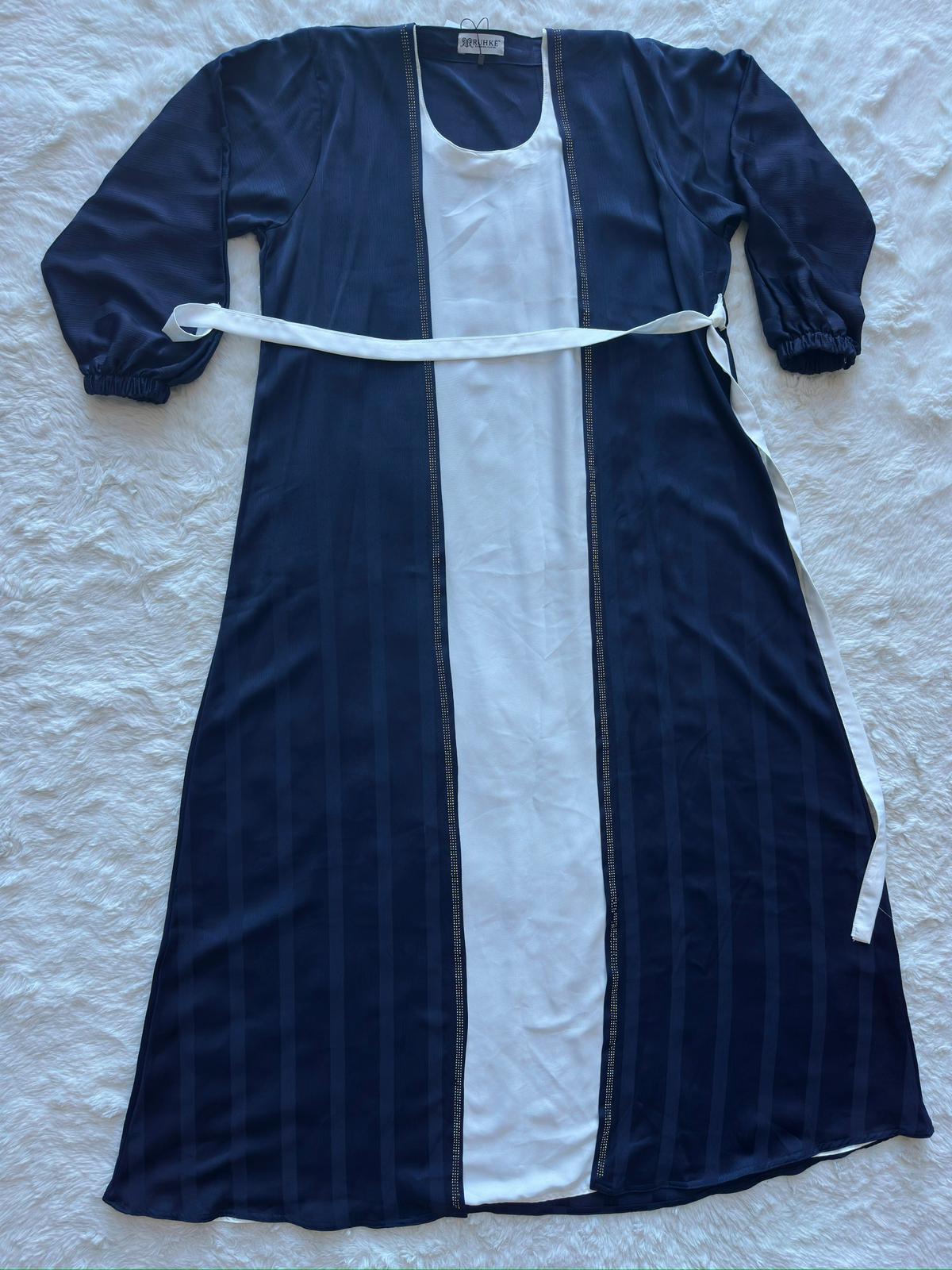 Royal navy textured silk abaya featuring a flowing silhouette and refined luxury finish by RUHKÉ Australia