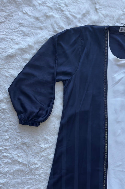 High-end royal navy silk abaya showcasing soft texture and sophisticated drape ARM