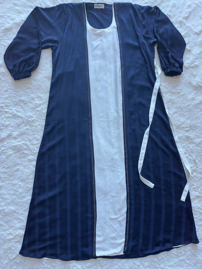 FLAT LAY Luxury modest abaya in royal navy textured silk, perfect for Eid and formal occasions