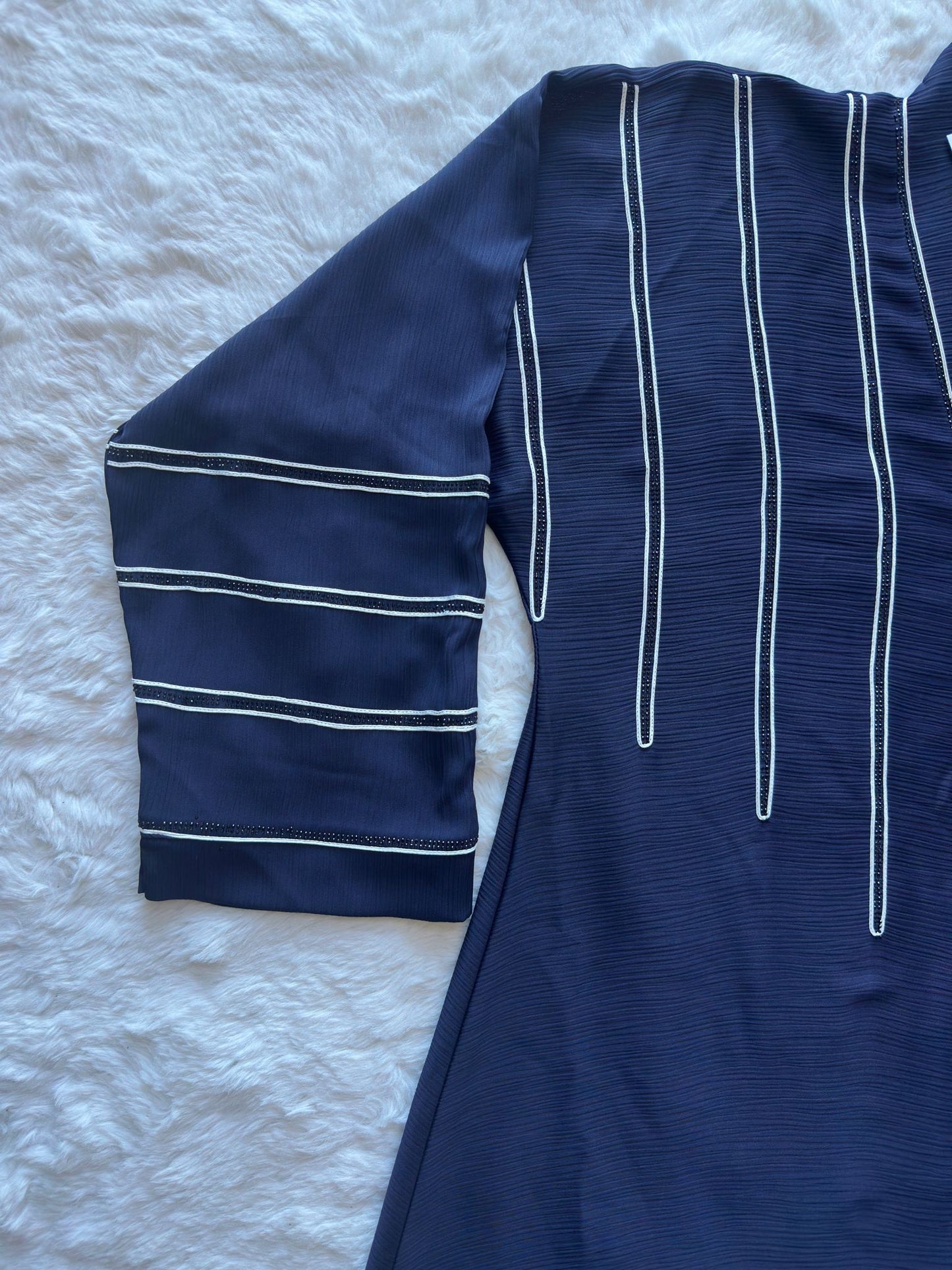 Royal navy designer abaya in textured silk with refined flared cut and stone detailing