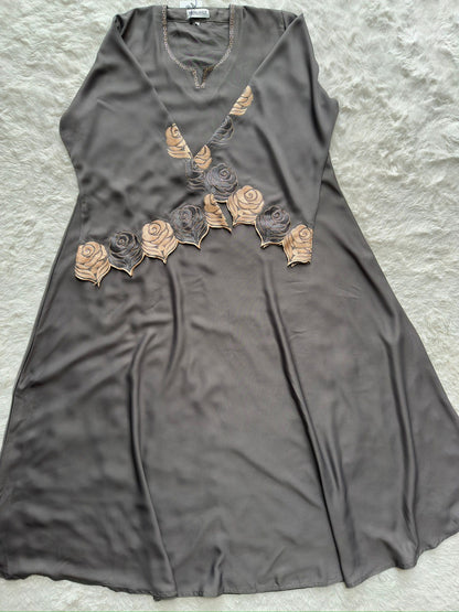 Elegant grey nida abaya featuring intricate thread embroidery and stone embellishment on cut-work sleeves