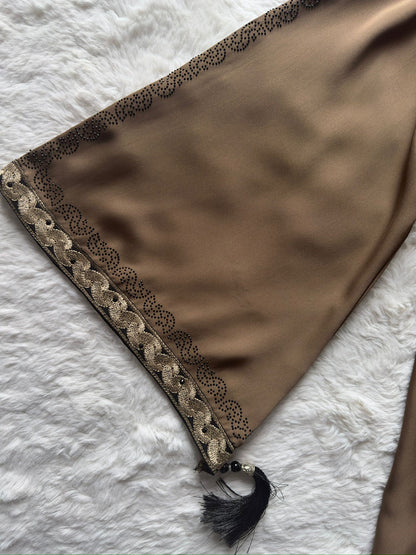 RUHKÉ luxury black abaya with ornate gold embroidery, stone detailing and flowing modest silhouette