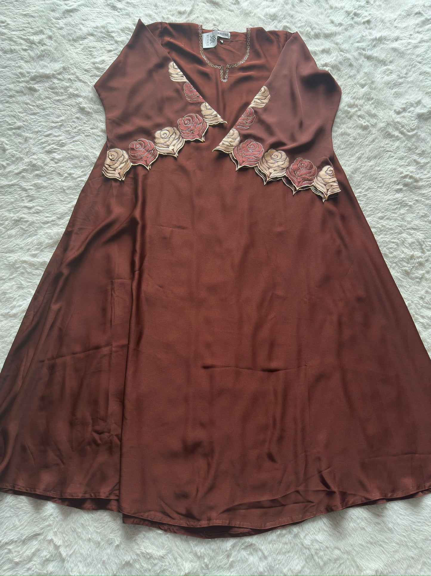 Elegant brown nida abaya featuring intricate thread embroidery and stone embellishment