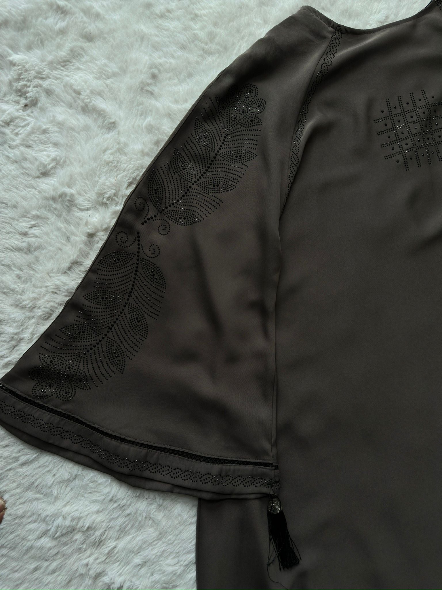 Full length luxury grey abaya in premium Nida fabric with smooth drape and wide flare hemline, modest fashion by RUHKÉ arm