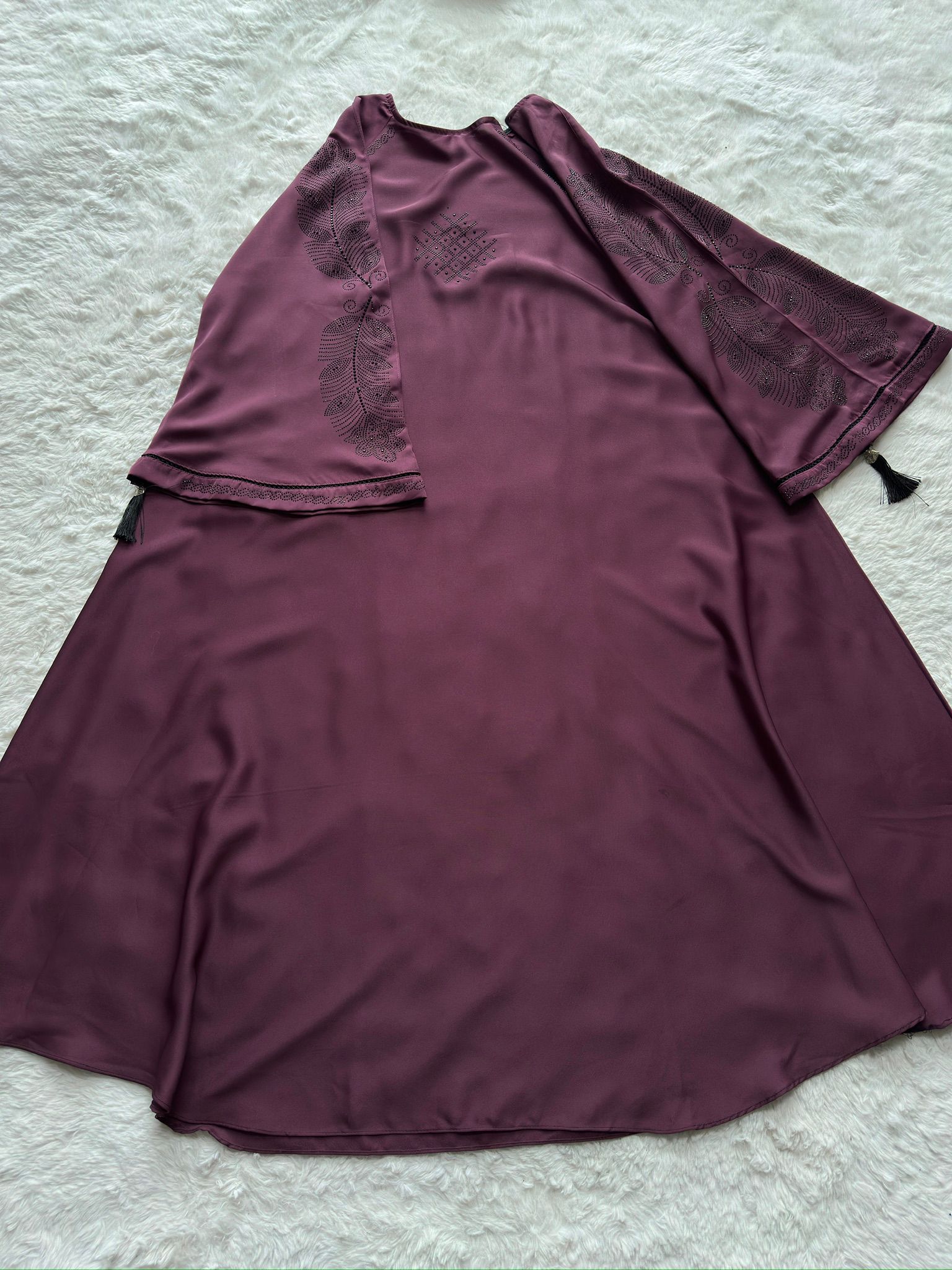 Luxury plum premium Nida abaya with delicate stone and thread embroidery on sleeves and chest, elegant modest wear by RUHKÉ flat lay