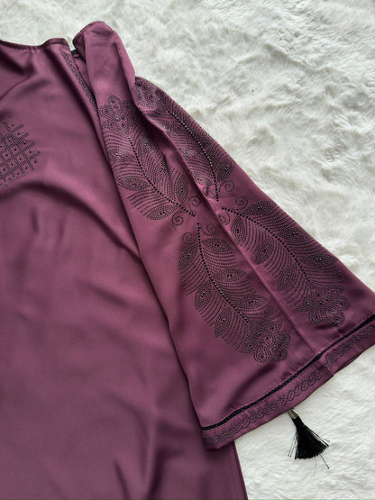Close-up of plum premium Nida abaya showcasing refined stone and thread embroidery on sleeves peacock work