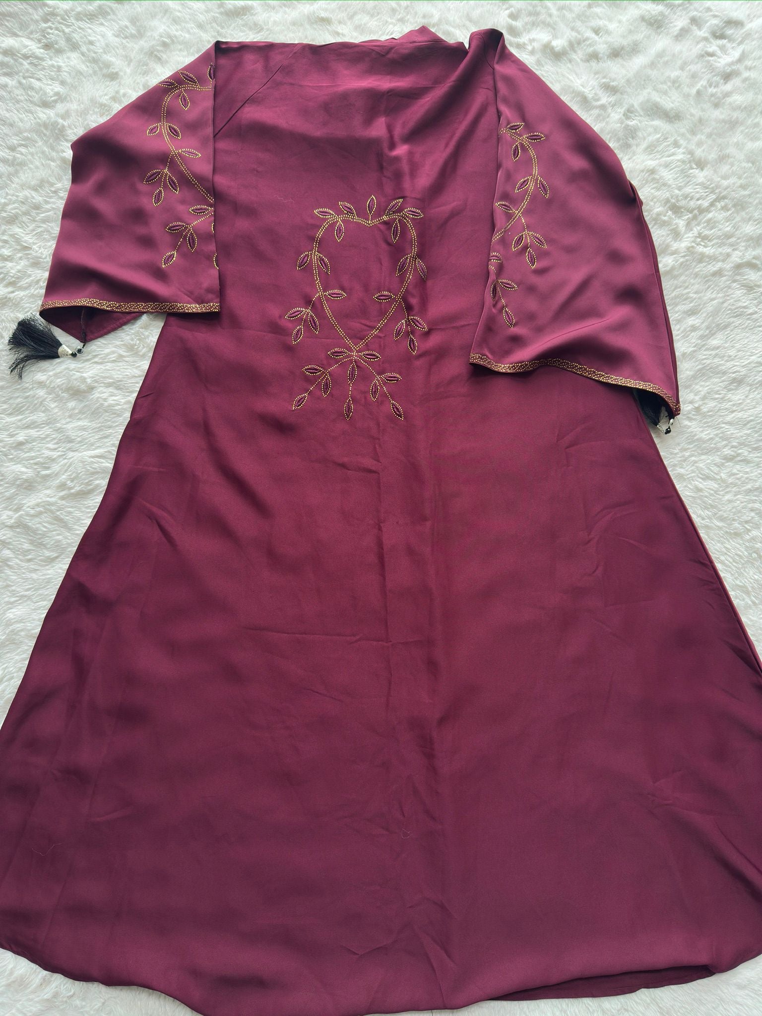 Back view of luxury maroon Nida abaya with elegant 