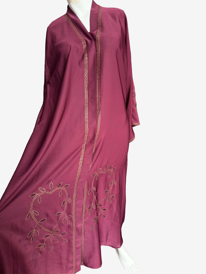 Front open maroon Nida abaya featuring button closure and gold stone work embroidery along both front panels