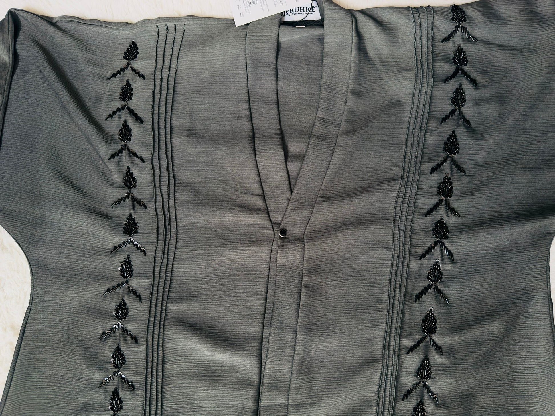 Modest front open abaya with black hand embroidery on crepe fabric