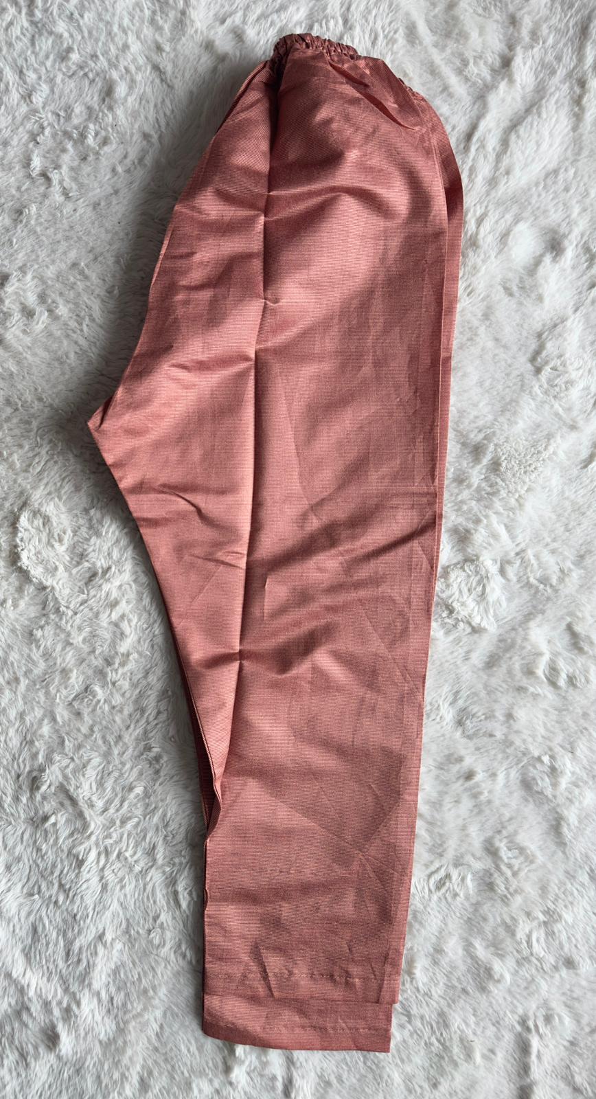 Front view of luxury dusty rose kurta featuring intricate thread embroidery and elegant cut-work detailing by RUHKÉ Trouser