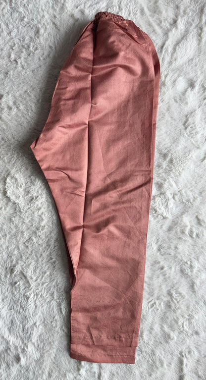 Front view of luxury dusty rose kurta featuring intricate thread embroidery and elegant cut-work detailing by RUHKÉ Trouser