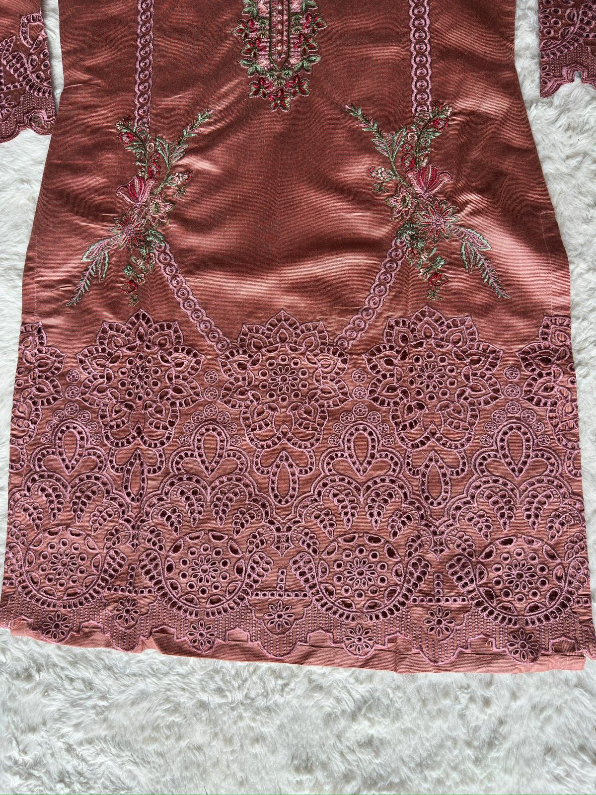 Side angle showcasing premium fabric texture and cut-work sleeve detailing on dusty rose embroidered kurta by RUHKÉ
