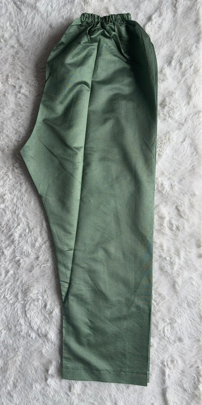 Sophisticated sage green cut-work kurta with fine thread and zari embroidery, styled with a premium organza net dupatta – RUHKÉ