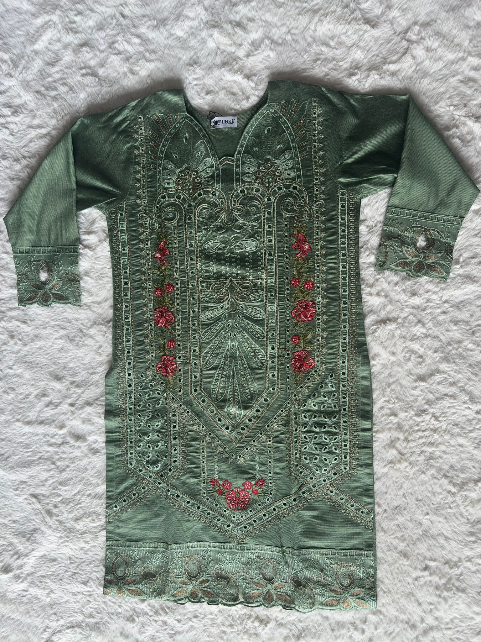 Premium sage green embroidered kurta featuring cut-work borders, fine thread and zari work, styled with a sheer organza dupatta – RUHKÉ