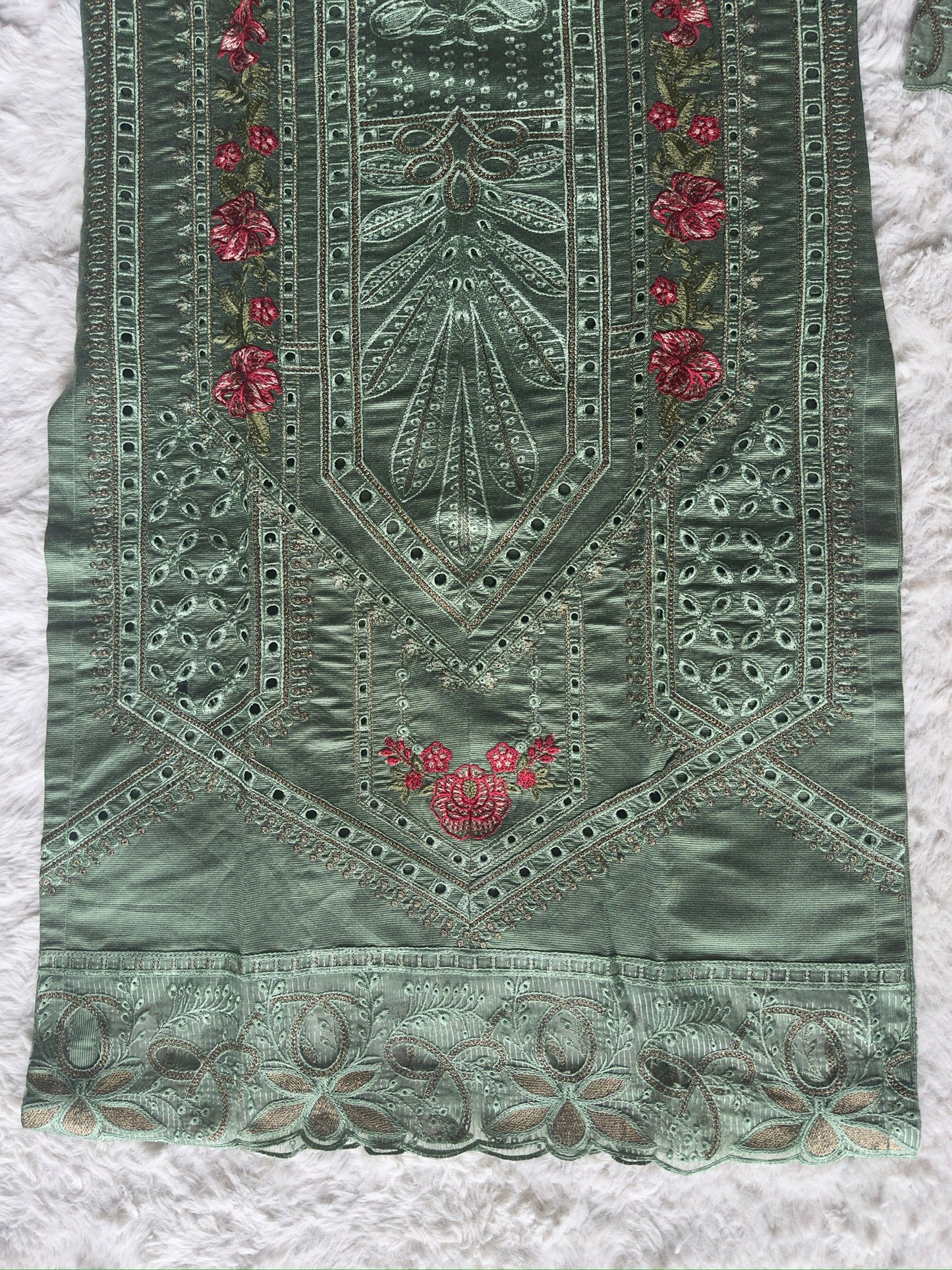 Designer sage green kurta with handcrafted cut-work, floral thread embroidery and zari work, finished with an organza net dupatta