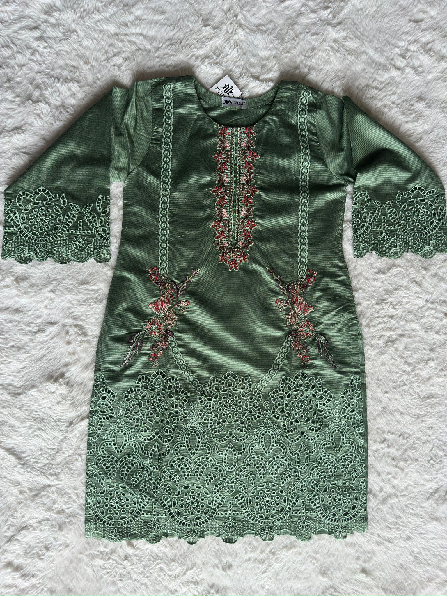 Luxury sage green embroidered kurta with intricate cut-work detailing and floral thread embroidery, styled with a silk dupatta | RUHKÉ