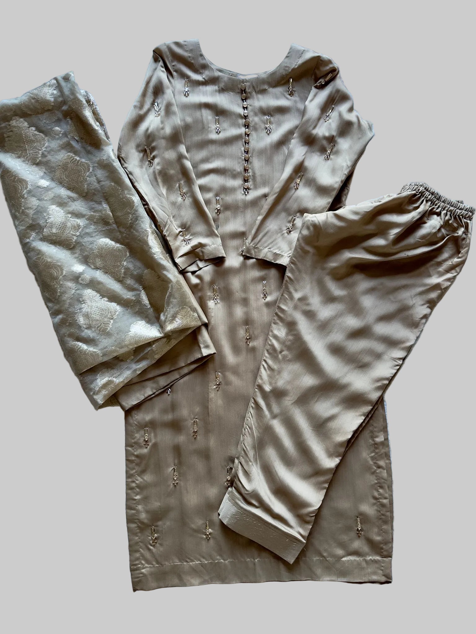 Luxury champagne kurta set with viscose silk fabric and hand beaded detailing