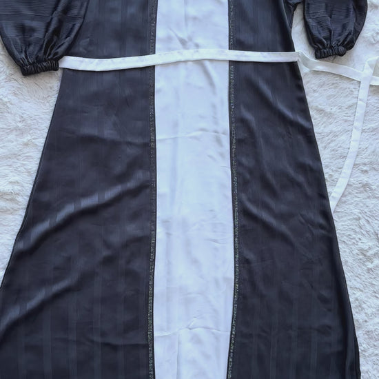 Charcoal grey silk abaya with textured finish and sophisticated flared design video