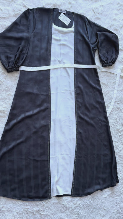 Charcoal grey silk abaya with textured finish and sophisticated flared design video