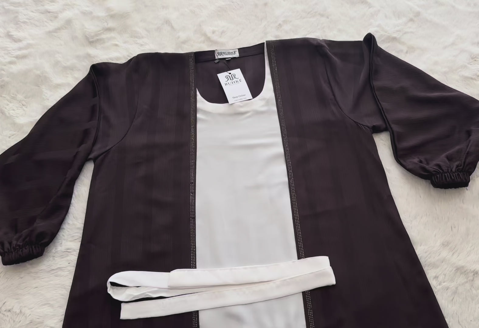 Front view of brown crinkle crepe silk Video blend open abaya with white Korean silk crêpe hijab
