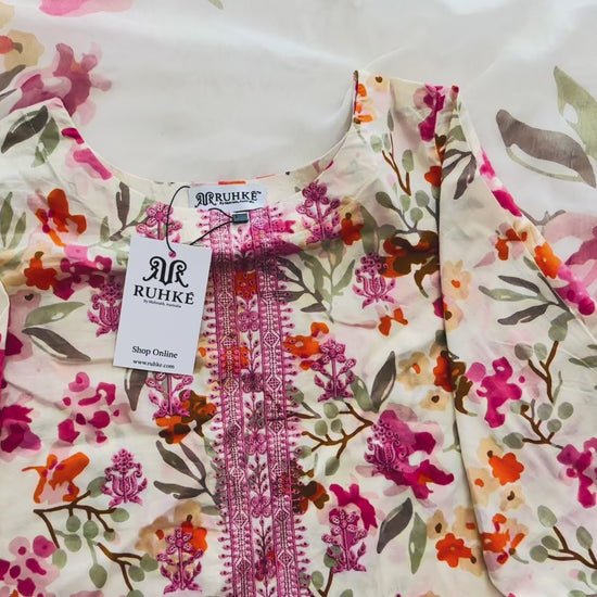 Video showcasing floral cream printed 3-piece lawn suit with chiffon dupatta, highlighting fabric flow, fit, and luxury finish