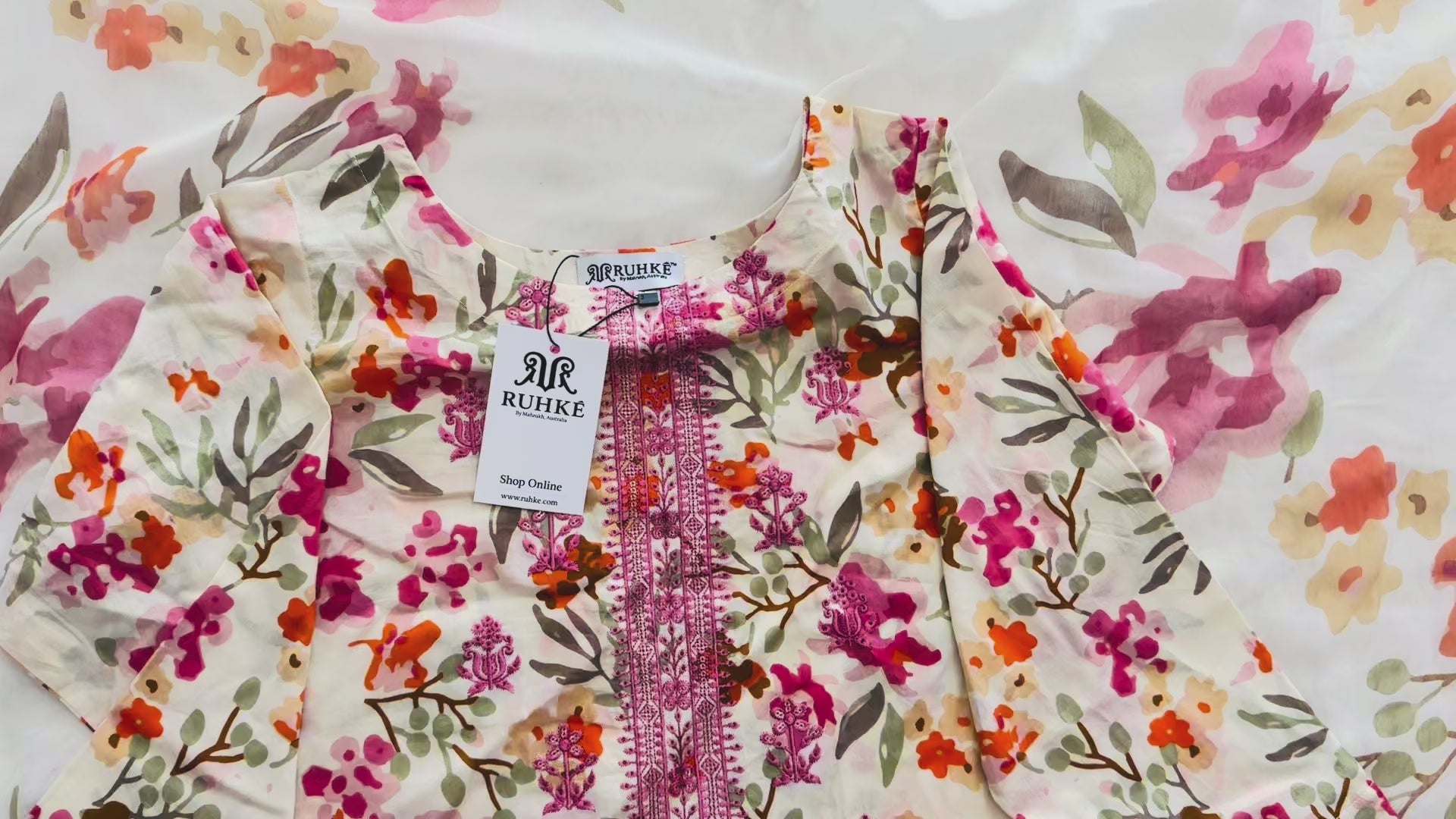 Video showcasing floral cream printed 3-piece lawn suit with chiffon dupatta, highlighting fabric flow, fit, and luxury finish