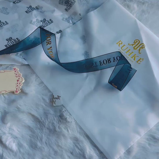 High-end luxury packaging showcasing RUHKÉ signature branding Video