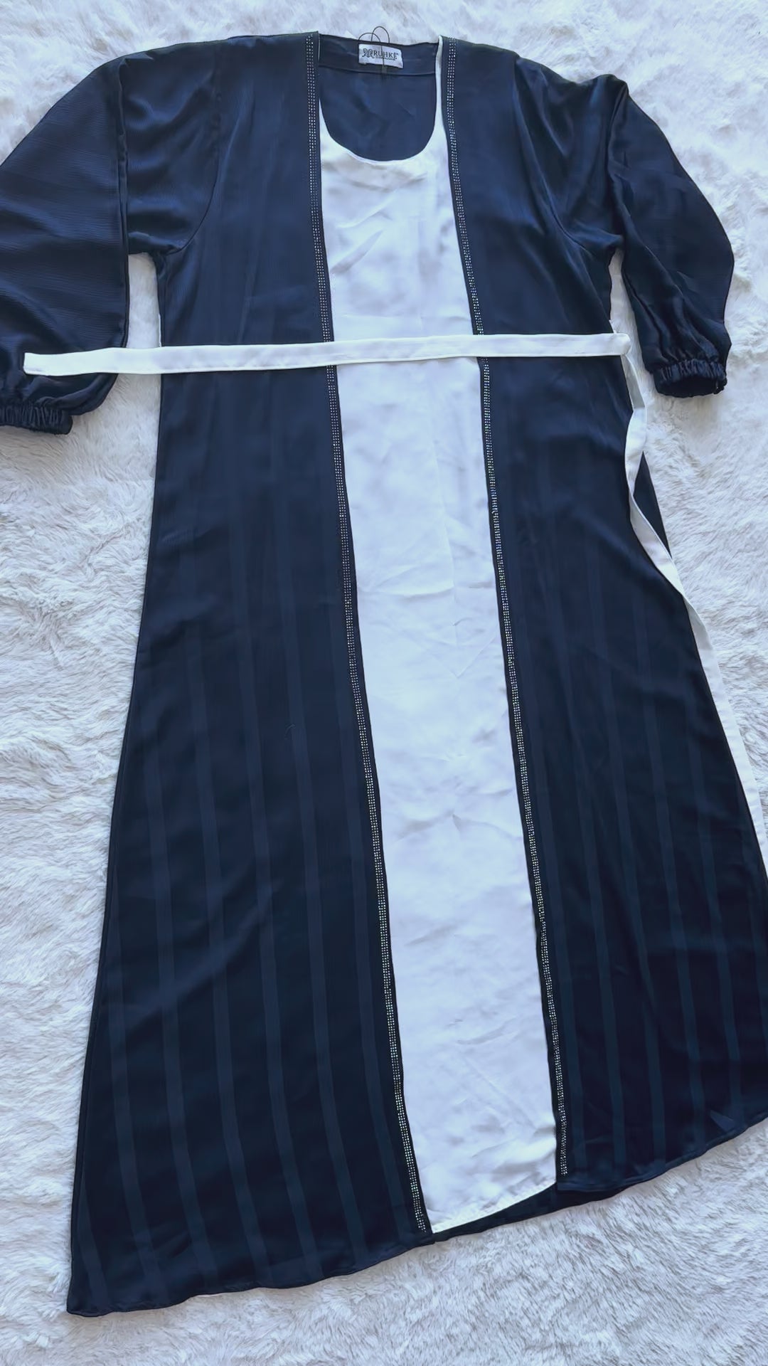 VIDEO Luxury Royal Navy textured silk abaya for women by RUHKÉ Australia, elegant designer modest wear with fluid drape and premium silk finish
