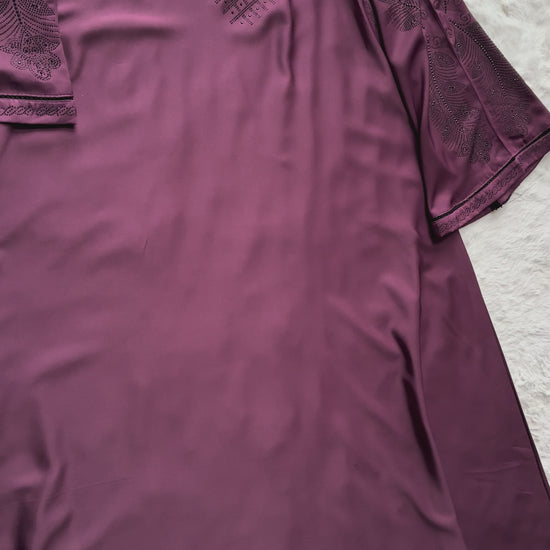 Full length plum luxury abaya crafted from premium Nida fabric with soft drape and elegant flare design video